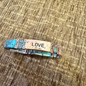 Verdigris and copper colored stretch bracelet.